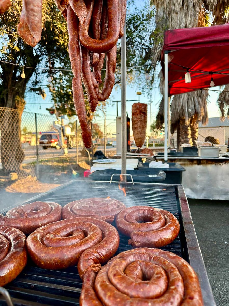 Chorizo rings on the charcoal grill